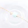 Les Rubans de Marionnette Bracelets>Bracelet Perles Carrées - bleu aqua